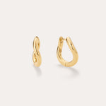 The Nori Twisted Hoop Earrings in Gold, featuring an 18k gold-plated, organically twisted design, are displayed on a plain light background—one shown from the front and one from the side to highlight their fluid curves.