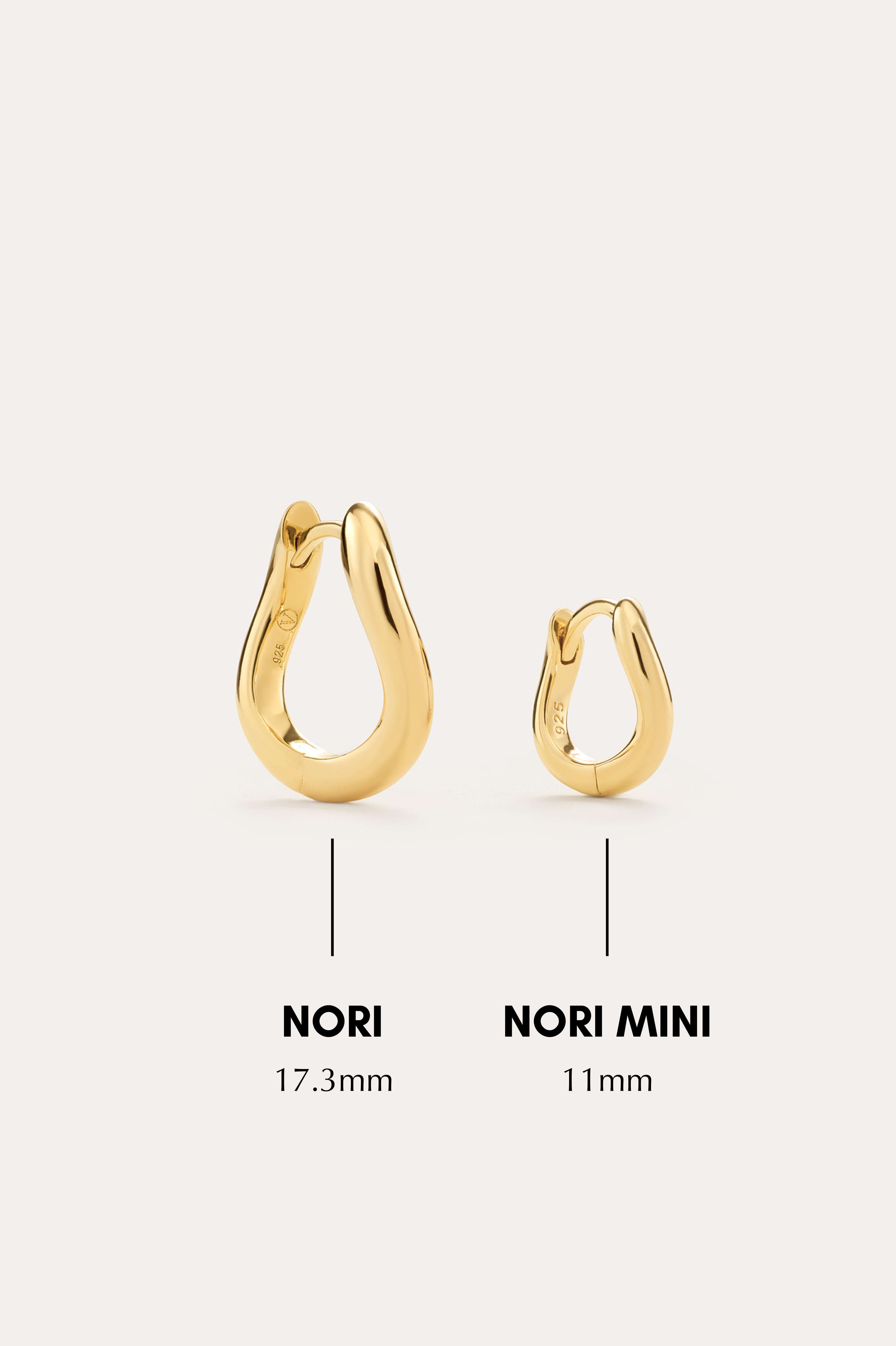 Two minimalist hoop earrings displayed side by side on a neutral background; the left is NORI (17.3mm), and the right is Nori Mini Twisted Huggies in Gold (11mm)—perfect gold-plated huggies for everyday style.