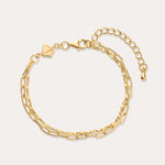 Gold chain bracelet on a white background