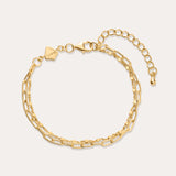 Gold chain bracelet on a white background