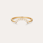 The Reine Rainbow Crystal Ring in Gold features a curved row of small, round crystals set along the top, shown on a simple light background.