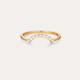 The Reine Rainbow Crystal Ring in Gold features a curved row of small, round crystals set along the top, shown on a simple light background.