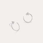 Reneé Triangle Linear Hoop Stud Earrings in Silver feature small textured triangles at the ends of sleek hoops, shown on a plain light background.