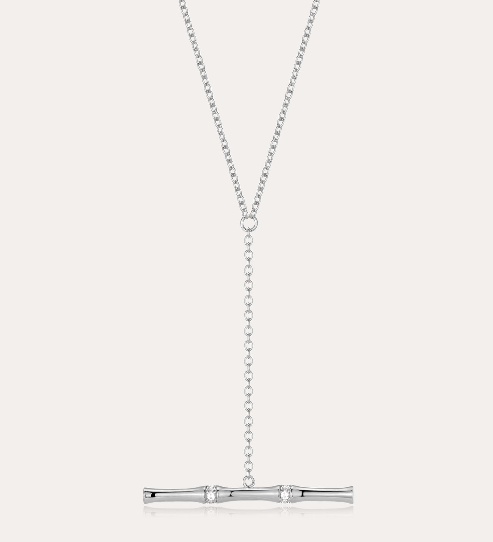 The Bamboo Chain Y-Bar Lariat Necklace in Silver features a delicate vertical chain drop ending with a polished horizontal bar, set against a simple light background.