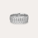 The Charlotte Eternity Ridged Ring in Silver features a rounded, ribbed design around its band and is showcased on a plain light background.