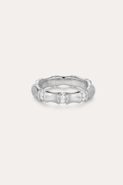 The Bamboo Chunky Crystal Ring in Silver is crafted from recycled sterling silver, featuring three sections set with sparkling crystals and a bamboo-inspired design, shown against a plain, light background.