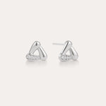 A pair of Colette Droop Link Studs in Silver, with smooth, rounded triangular shapes and small embedded cubic zirconia crystals on one side, displayed on a plain light background.