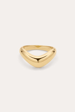 The Vava Plain Chunky Curved Wave Ring in Gold features a smooth, polished gold-plated finish with a minimalist, curved and slightly pointed front, showcased on a simple light background.