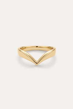 The Veda Plain Chevron Ring in Gold is a minimalist, gold-plated wishbone ring with a sleek V-shaped design, shown against a simple light background.