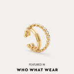 The Vina Crystal Bezel Ear Cuff in Gold adds a touch of crystal elegance with its sparkling bezel details.