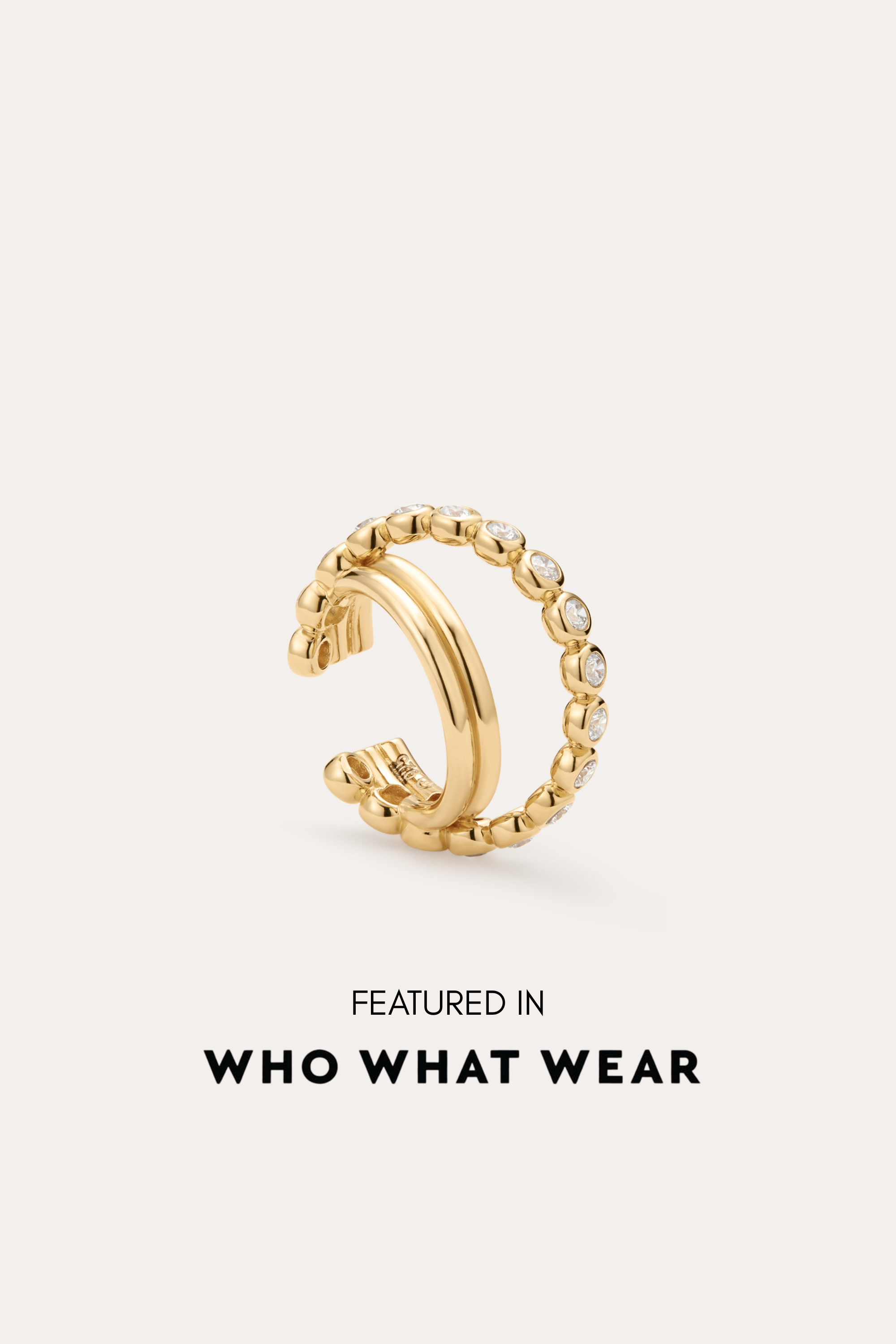 The Vina Crystal Bezel Ear Cuff in Gold adds a touch of crystal elegance with its sparkling bezel details.