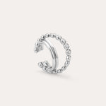 Pair the Vina Crystal Bezel Ear Cuff in Silver with a chic open silver ring, featuring one smooth band and another band dotted with sparkling cubic zirconia stones for a coordinated, stylish look.