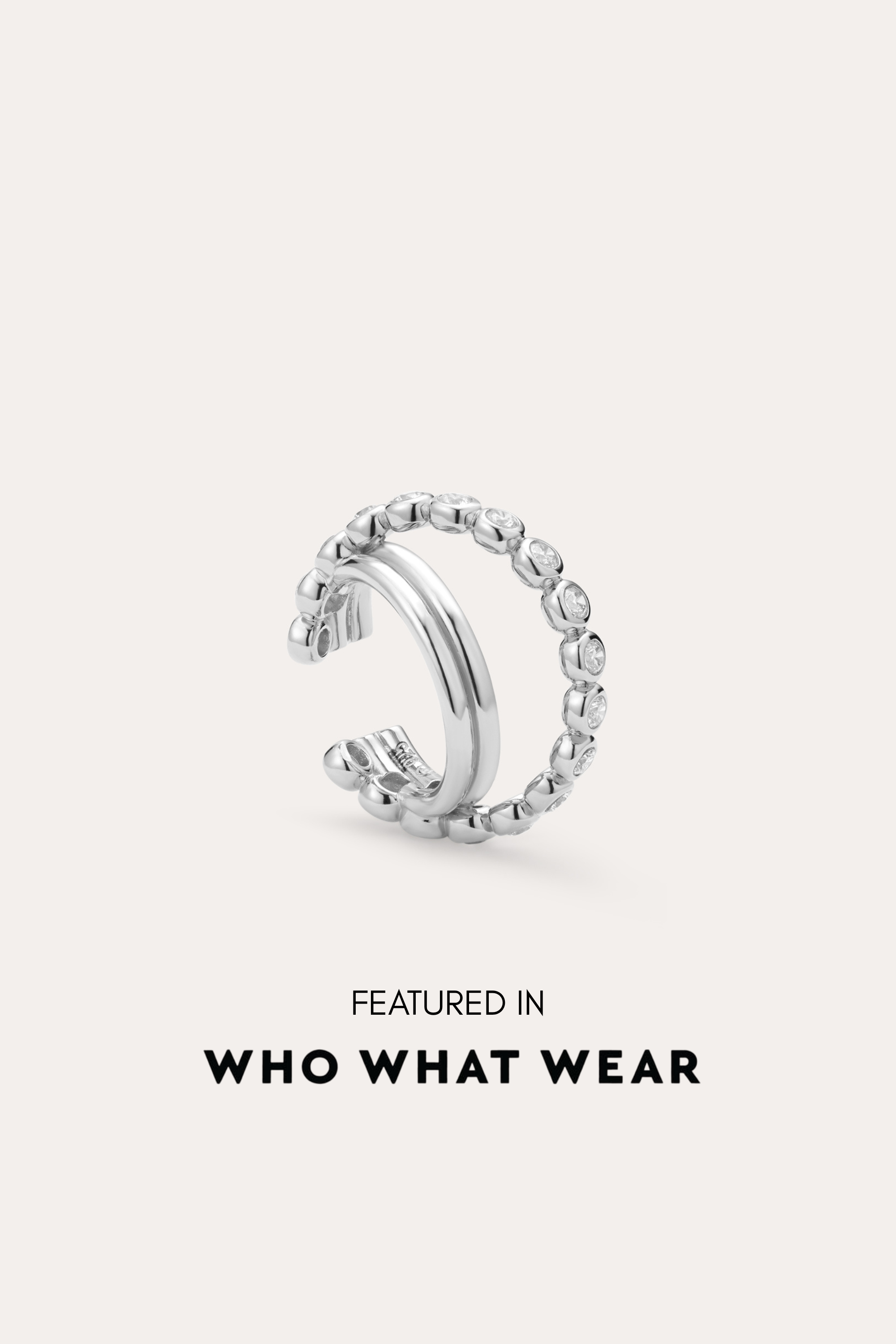 The Vina Crystal Bezel Ear Cuff in Silver, a non-pierced ear cuff with a beaded design, is shown on a light background and has been featured in Who What Wear.