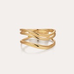 The Zoe Triple Wave Ring in Gold features three slim, wavy gold-plated bands intertwined for a modern, elegant look against a plain light background.