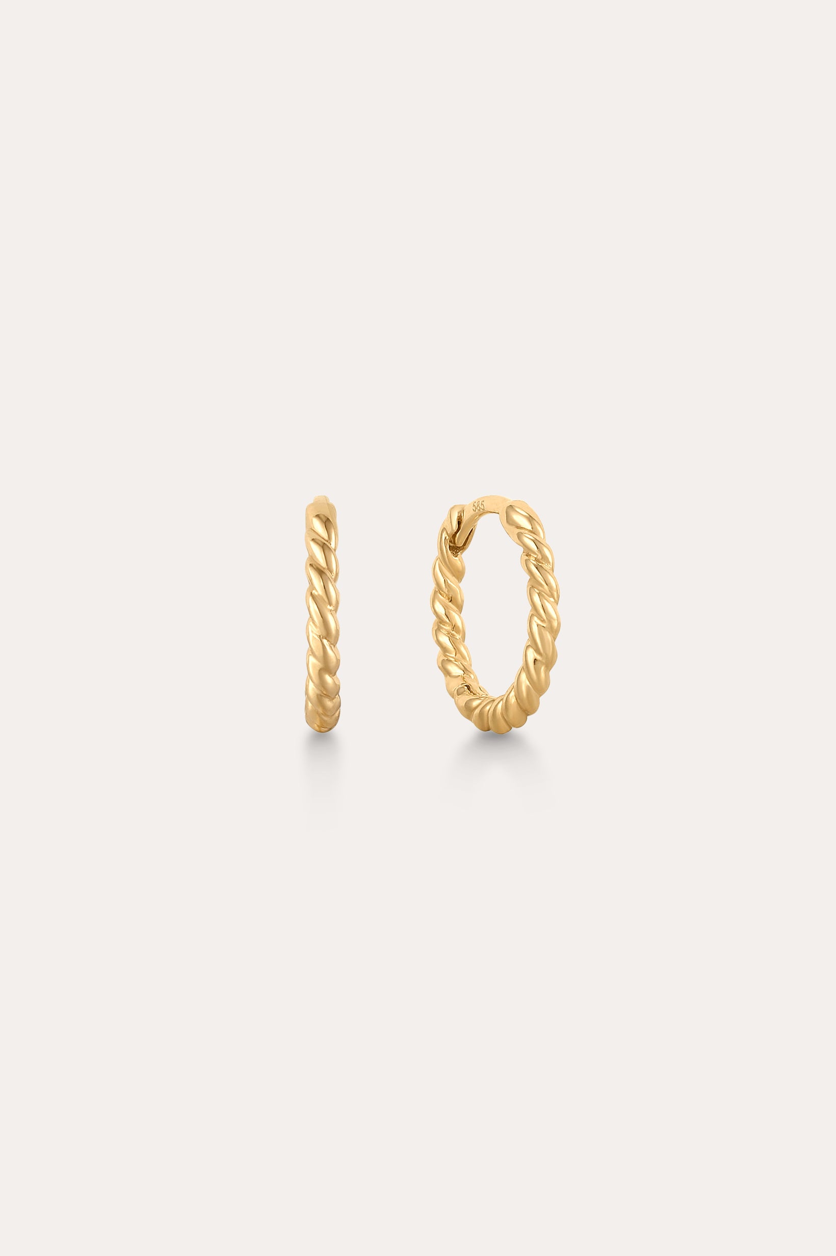 sold_gold_twisted_huggie_earrings